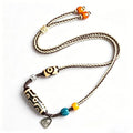 Nine-Eyed Dzi Necklace with Zha Ji Lhamo